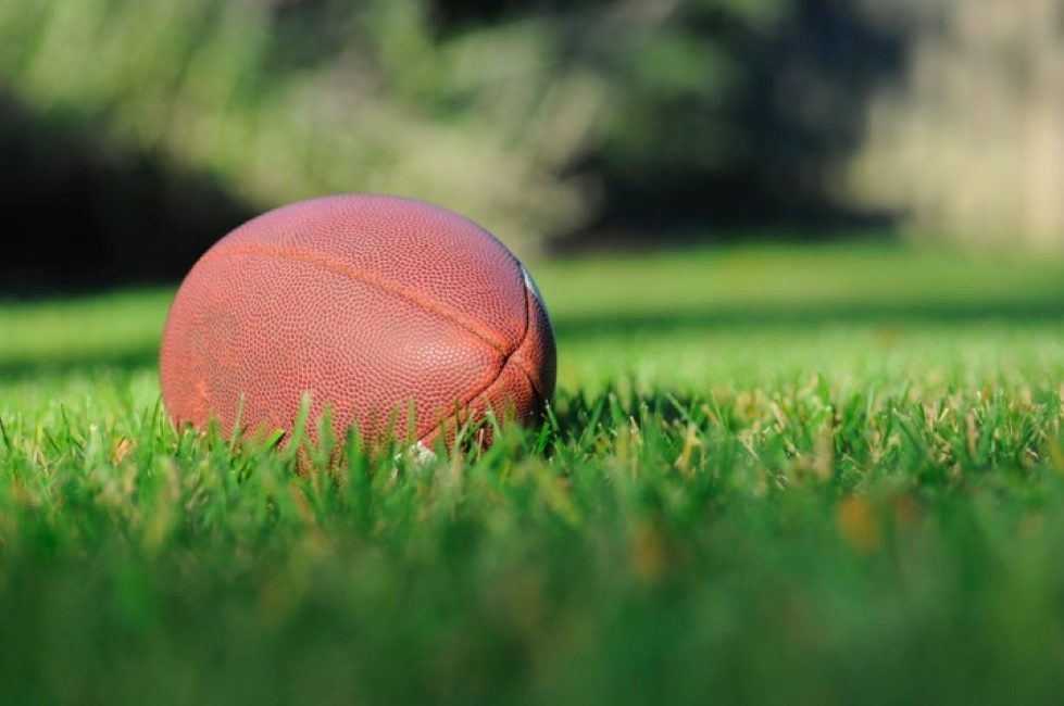 Football on a lawn